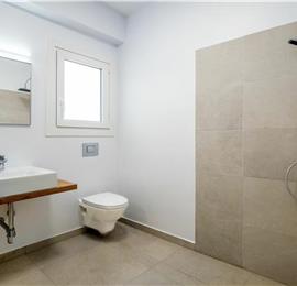 4 bedroom villa with infinity pool and sea view in Perithia, Corfu, sleeps 9